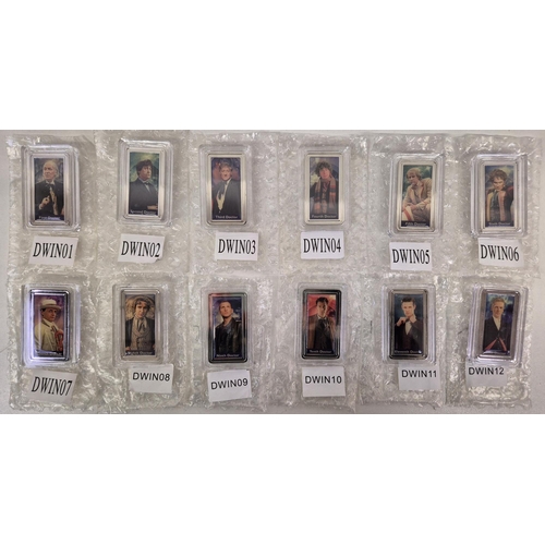 619 - A complete set of 12 Dr Who ingots, by Danbury Mint, complete with the original pictorial display fr... 