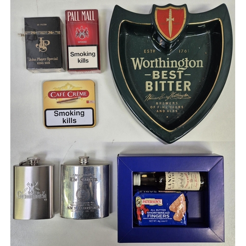 632 - A mixed lot of vintage drinkware & smoker's items. To include branded ashtrays, three port/whisky mi... 