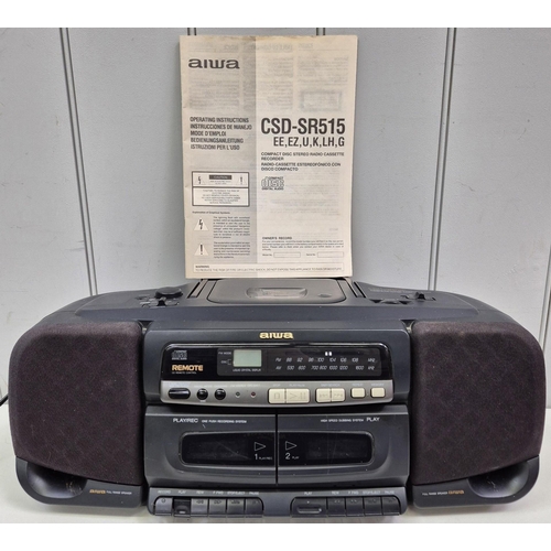 653 - An Aiwa portable CD/Radio/Cassette, model no.CSD-SR515, together with an Amstrad portable Twin Casse... 