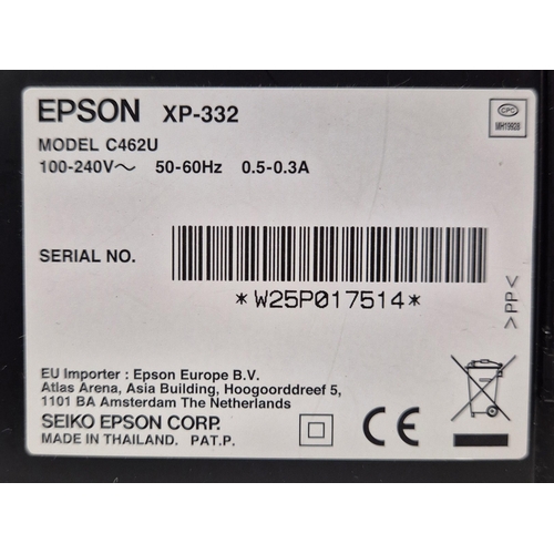 658 - An Epson Expression Home printer/copier/scanner, model no. XP-332; together with a quantity of photo... 