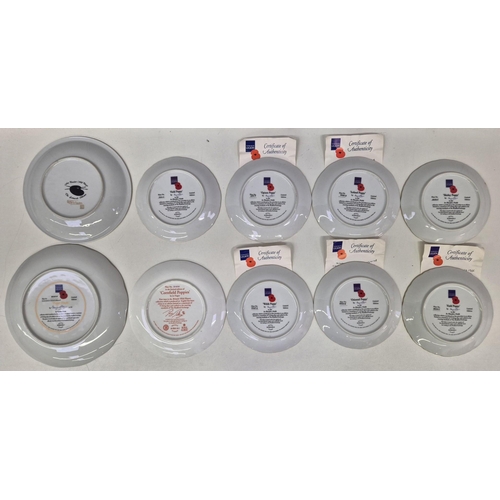 667 - A collection of 10 floral collector's display plates, 4 complete with a certificate of authenticity.... 