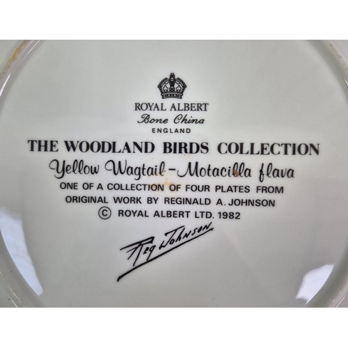 672 - A collection of 20 Royal Albert collector's display plates, from The Woodland Birds Collection.