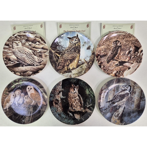 674 - A collection of 11 Wedgwood/Danbury Mint wildlife-themed collector's display plates.