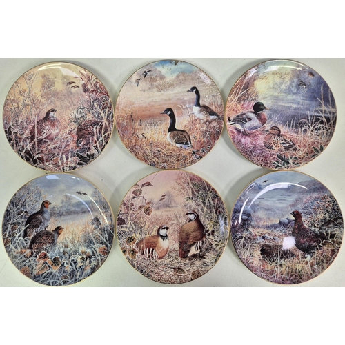 676 - A collection of 12 Wedgwood - Game Birds of Britain Collection collector's display plates.