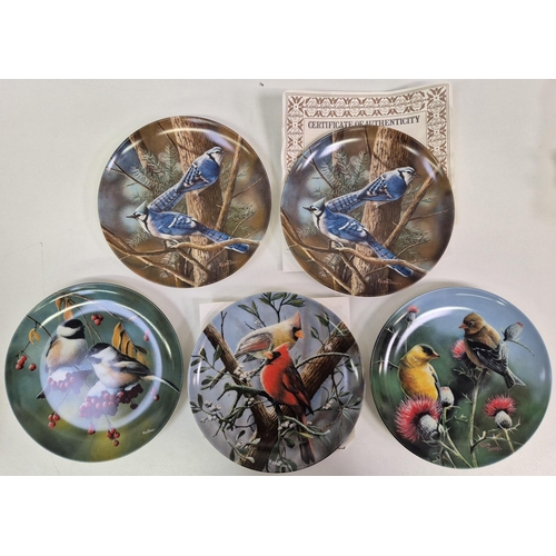 677 - A collection of 9 Knowles wildlife-themed collector's display plates. Mostly complete with certifica... 