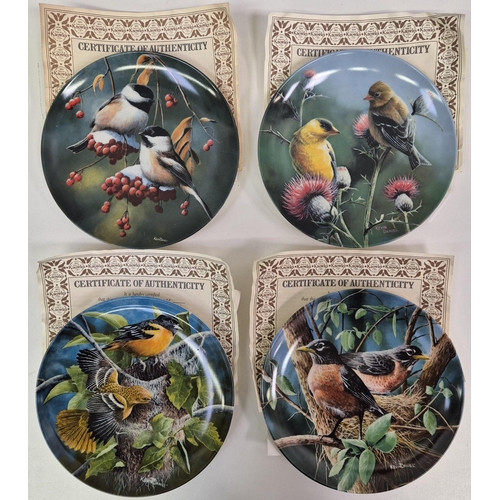 677 - A collection of 9 Knowles wildlife-themed collector's display plates. Mostly complete with certifica... 