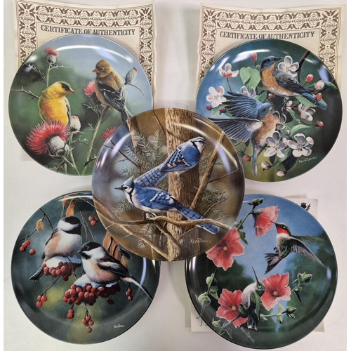 680 - A collection of 9 Knowles wildlife-themed collector's display plates. Mostly complete with certifica... 