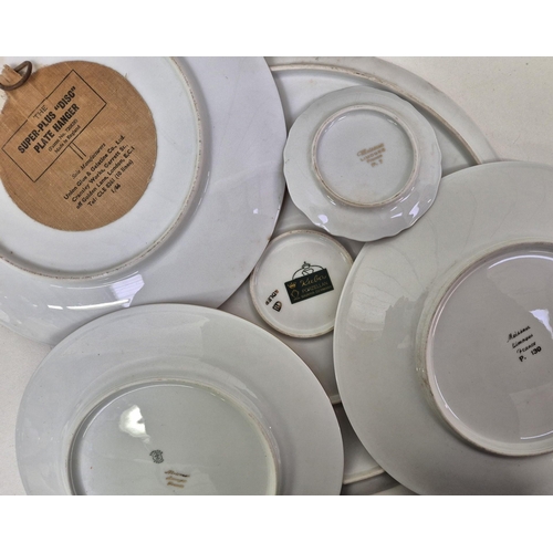 688 - A collection of 10 vintage collector's display plates. Makers include mostly Limoges & Kuba.