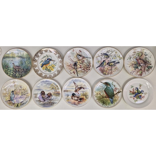 691 - A collection of 32 mixed display plates, pin dishes & tableware, each with a wildlife/countryside th... 