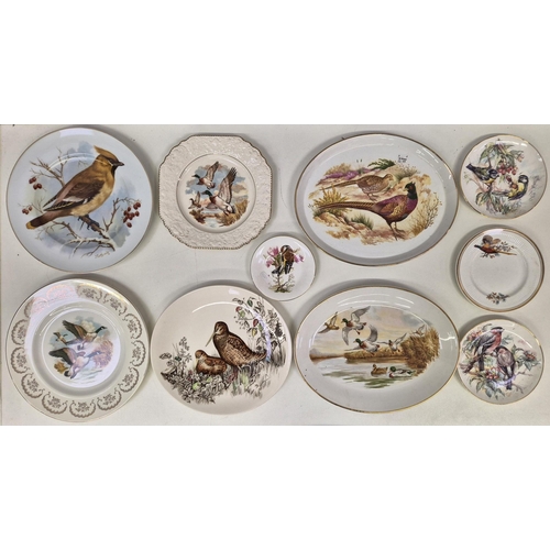 691 - A collection of 32 mixed display plates, pin dishes & tableware, each with a wildlife/countryside th... 