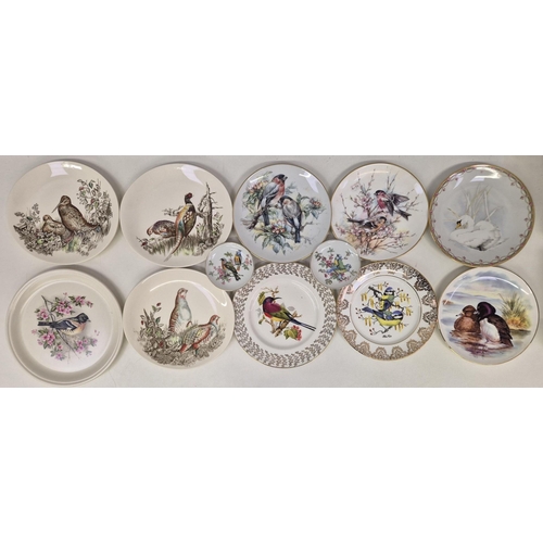 691 - A collection of 32 mixed display plates, pin dishes & tableware, each with a wildlife/countryside th... 