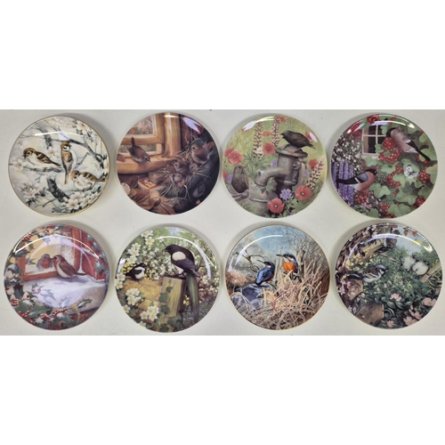 696 - A collection of 16 Coalport wildlife-themed collector's display plates.