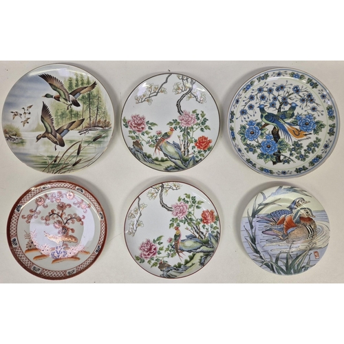 698 - A collection of 11 Asian-origin wildlife-themed collector's display plates. Makers include Saji, Sat... 