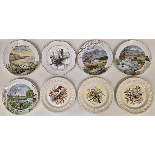 703 - A collection of 17 Royal Worcester wildlife-themed collector's display plates.