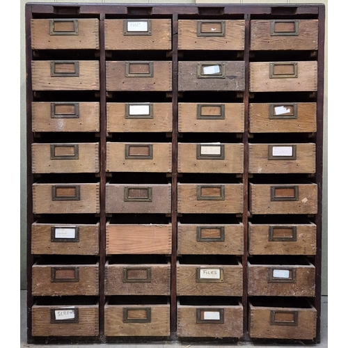 A set of mid-century oak filing drawers. 8 tier, with a total of 32 drawers. Dimensions(cm) H122, W96, D40.