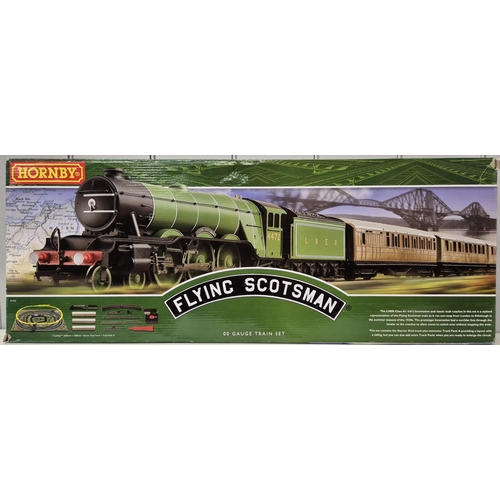 A boxed Hornby OO gauge 'Celebrating 100 Years of Flying Scotsman' Train set. Model no. R1255.