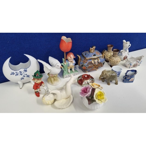 453 - An assortment of various trinkets and figurines, including a 'Satsuma' incense burner, a rarer 'Delf... 