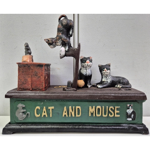 A vintage mechanical cast iron Cat and Mouse money bank. Dimensions(cm) H13, W20, D5.