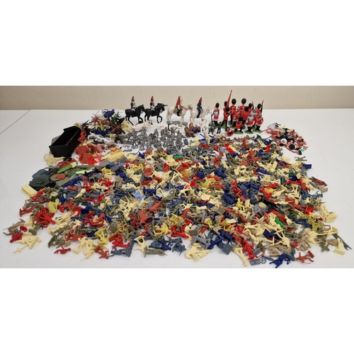 A massive collection of vintage, plastic toy soldiers, Cowboys & Indians, together with a toy holster.