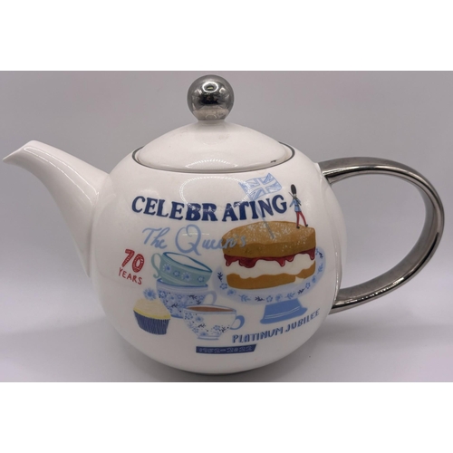 702 - Collection of tableware. To include QEII Platinum Jubilee teapot & cup, Queen Anne cups, saucers & s... 