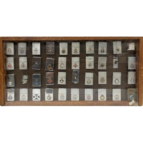 Zippo Lighters (x37) - Navy interest. With display case. Part of a large collection of rare lighters, assembled predominantly during 1980's and contributed to by serving military personnel. To include:-
HMS Achilles; HMS Active; HMS Alacrity; HMS Apollo; HMS Arrow; HMS Aurora; HMS Ajax; HMS Battleaxe; HMS Beaver; HMS Boxer; HMS Brave; HMS Brilliant; HMS Dido; HMS Diomede; HMS Falmouth; HMS Gurkha; HMS Hardy; HMS Hydra; HMS Juno; HMS Leander; HMS Londonderry; HMS Lowestoft(x2); HMS Minerva; HMS Naiad; HMS Penelope; HMS Phoebe; HMS Rhyl; HMS Rothesay; HMS Rothesay 1988; HMS Scylla; HMS Sirius; HMS Torquay; HMS Yarmouth; HMS York; HMS Zulu & Falklands Stena Seaspread Naval Party 2200 1982-83.