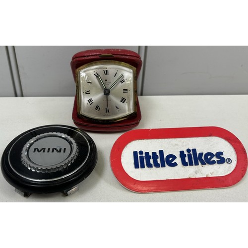 509 - Junghams cased travel clock, Mini car badge & Little Tikes sign.