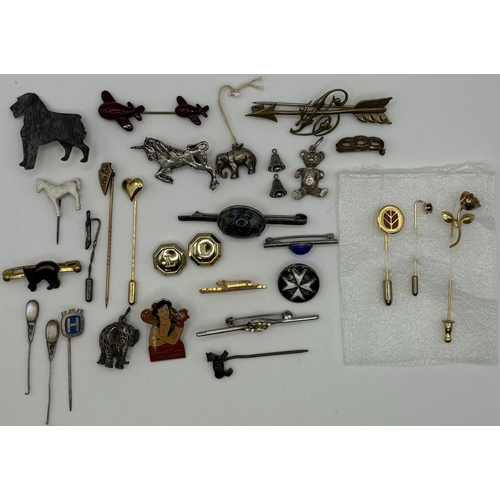 604 - Collection of tie pins, badges & button covers.