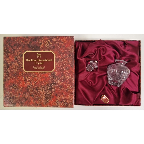 652 - A collection of 19 pieces of glass tableware. To include a boxed Royal Doulton crystal perfume bottl... 