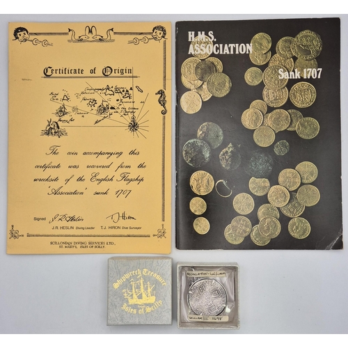 HMS Association shipwreck coin - William III 1698 Half Crown, with certificate of authenticity & brochure. On 22 October 1707, HMS Association struck the Outer Gilstone Rock, off the Isles of Scilly, and was wrecked with the loss of her entire crew of about 800 men.