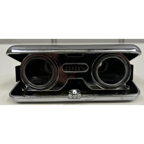 34 - Carl Zeiss Jenoptem 8x30 binoculars, together with a boxed set of vintage pocket binoculars.