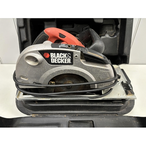 419 - Cased Black & Decker 1400w circular saw, model no. K565K & Plasplugs tile cutter.
