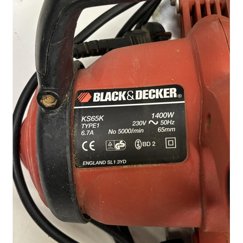 419 - Cased Black & Decker 1400w circular saw, model no. K565K & Plasplugs tile cutter.