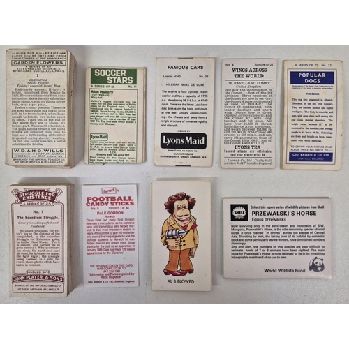 602 - A large collection of tea cards, together with a smaller selection of cigarette cards & other collec... 