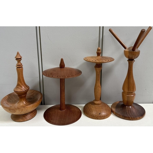 875 - Collection of turned stands & shuttle. Majority being earring display stands.