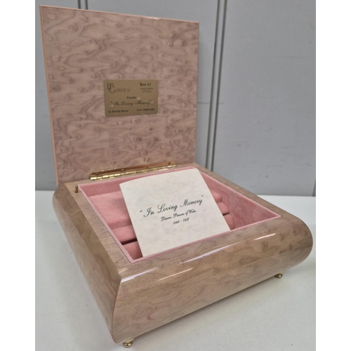 968 - A collection of 16 pieces of Royal memorabilia. To include multiple mugs, plates, books and notably ... 