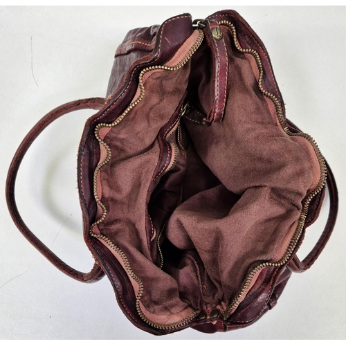 1130 - An original 'Campomaggi' Teodorano 1961 brown leather handbag.