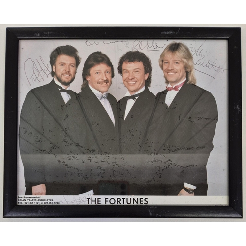 1405 - A framed photo of 'The Fortunes', signed by band members, together with a DVD of 'The Searchers in c... 