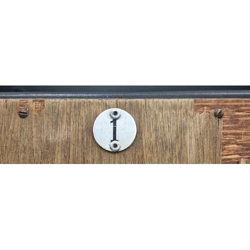 7025 - A bank of three original folding cinema seats, by 'PEL'. Tubular steel framed, with black leather se... 