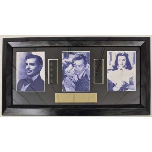 7029 - Gone With The Wind - half sheet framed movie poster, printed by Portal Publications Ltd 1976; togeth... 