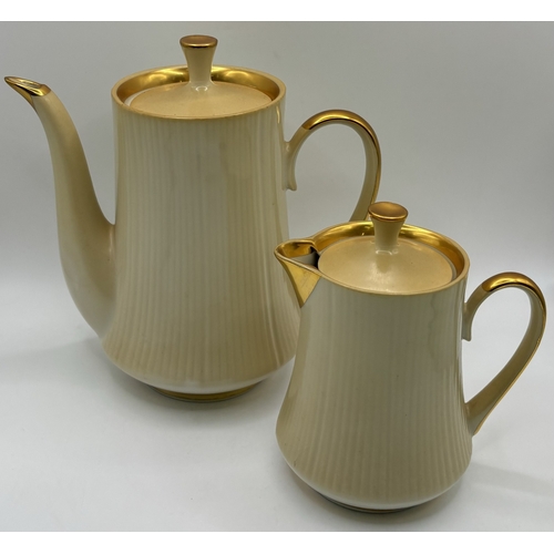 28 - Two coffee sets. To include 13-piece Ternopil (Ukrainian) & 15-piece Royal Doulton - Desert Star.