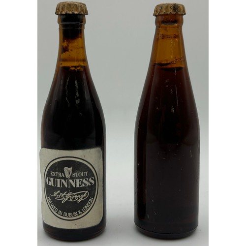 35 - Collection of three Wade ceramic dispensers, together with a vintage fun drinking glass & two bottle... 