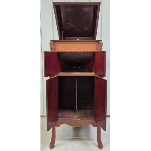 53 - Academy Gramophone housed in a freestanding oak cabinet. Complete with original supplier's nameplate... 