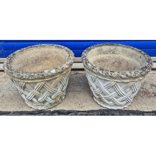 56 - Pair of lattice design stone garden planters. Dimensions(cm) H32, W42, D42.