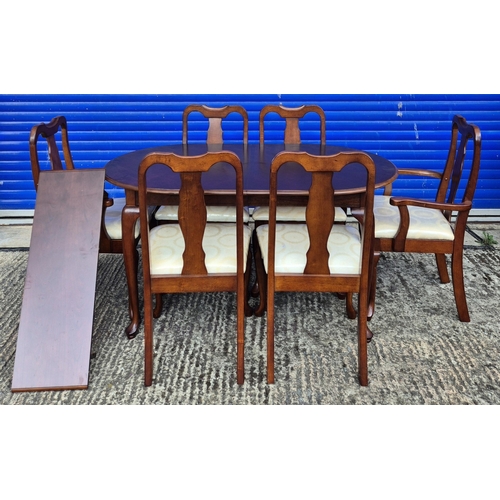 57 - Good quality reproduction extending dining table, with six fiddle back chairs (two carvers). Chair s... 