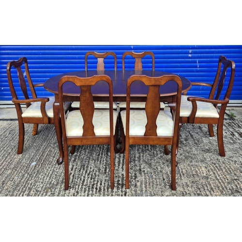 57 - Good quality reproduction extending dining table, with six fiddle back chairs (two carvers). Chair s... 