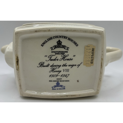 59 - Collection of eleven display teapots. To include rarer editions - Wade - White Rabbit & Sadler - Tud... 