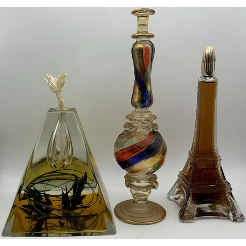 130 - Collection of glass decor. To include pyramid oil lamp/diffuser (likely French), elaborate multicolo... 