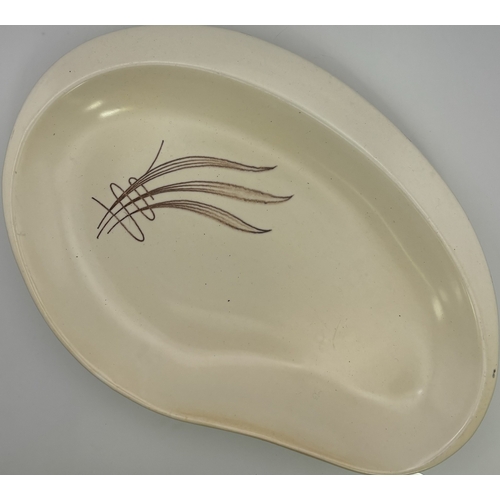 132 - Collection of 8 vintage ceramic tableware examples.