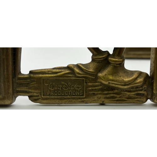 137 - Collection of vintage brass decor. To include pair of original Disney photo frames; letter holders, ... 