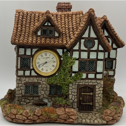 140 - Mixed collection of miniature cottages, together with a framed Osborne Ivorex plaque depicting Burns... 